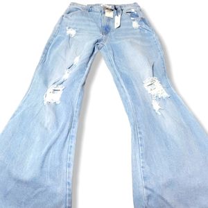 Rue21 Size 7 juniors stone washed denim bell bottoms.